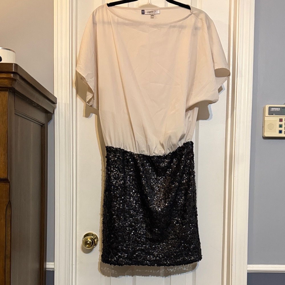 Jennifer Lopez Cream Top with Black Sequin Mini Skirt